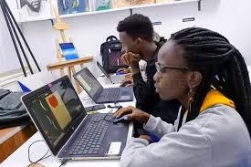 Student learning graphic design on a computer